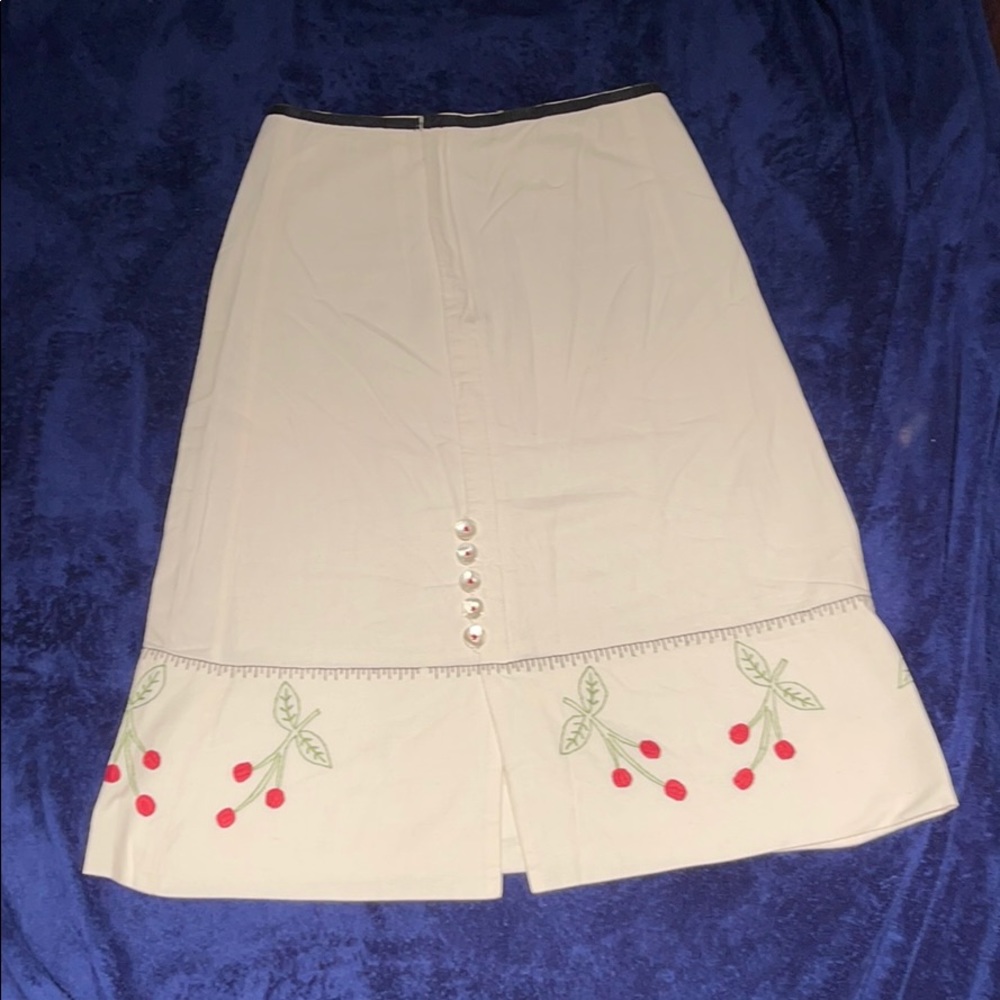 Long cream skirt with detail
